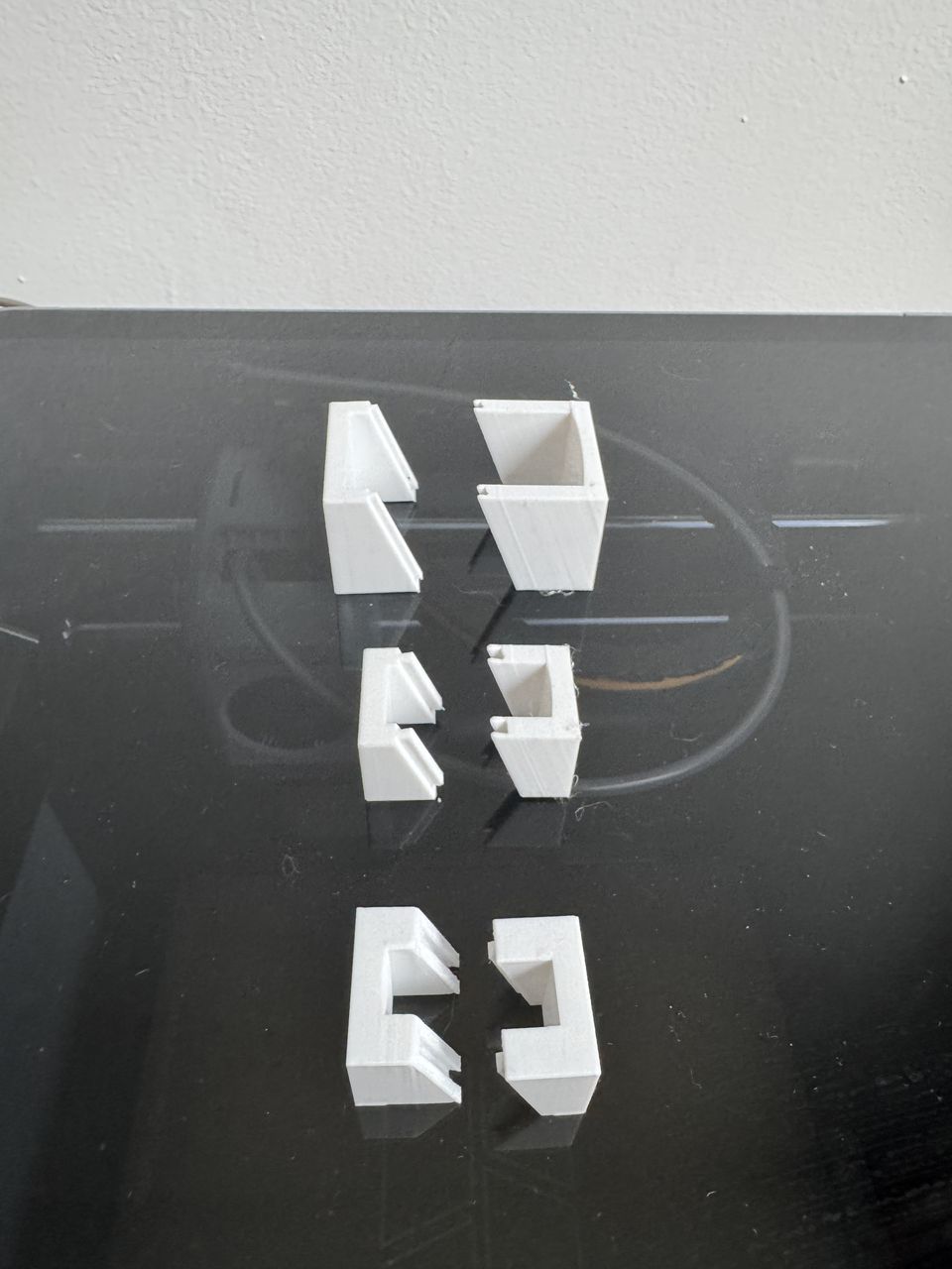 Three printed test pairs of the sliding dovetail joint at different tolerances