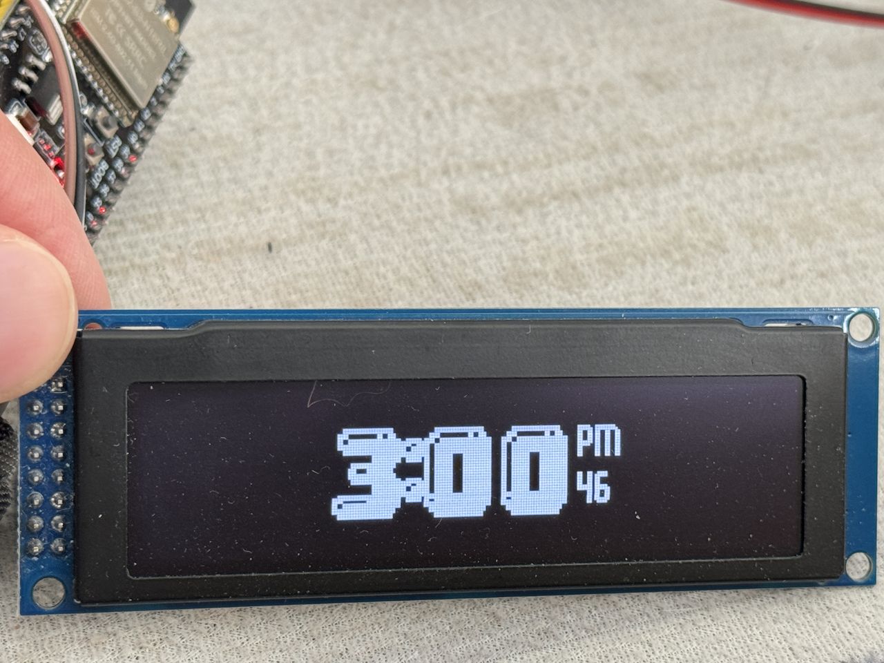 The standby clock face before the digit spacing was corrected, digits crowding the suffix
