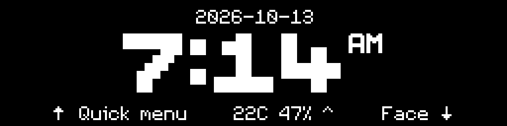 The CinderClock centered standby face, the time filling the panel with the date above and the environment reading on the bottom row